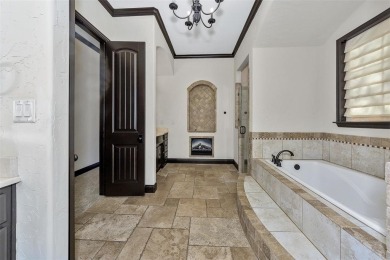 This exquisite modern Spanish-style custom home located in a on Sugar Tree Golf and Country Club in Texas - for sale on GolfHomes.com, golf home, golf lot