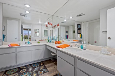 Enjoy Carefree living from this spacious corner unit with on Desert Island Golf and Country Club in California - for sale on GolfHomes.com, golf home, golf lot