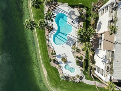 Enjoy Carefree living from this spacious corner unit with on Desert Island Golf and Country Club in California - for sale on GolfHomes.com, golf home, golf lot