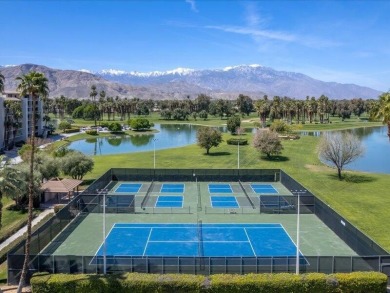 Enjoy Carefree living from this spacious corner unit with on Desert Island Golf and Country Club in California - for sale on GolfHomes.com, golf home, golf lot