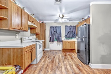 Leisure Village isn't just a place to live -- it's a lifestyle on Greenbriar Woodlands in New Jersey - for sale on GolfHomes.com, golf home, golf lot