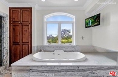 Welcome to this exceptional 7BD/6.5BA custom-built estate in on Rancho Park Golf Course in California - for sale on GolfHomes.com, golf home, golf lot