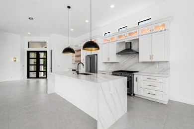 This amazing view complements the beautiful fully renovated 3 on BallenIsles Golf and Country Club in Florida - for sale on GolfHomes.com, golf home, golf lot