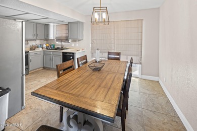 Nestled in a highly desirable central neighborhood, this on London Bridge Golf Course in Arizona - for sale on GolfHomes.com, golf home, golf lot