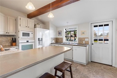 Welcome to 151 Ives Road, a bright and charming 3-bedroom home on Potowomut Golf Club in Rhode Island - for sale on GolfHomes.com, golf home, golf lot