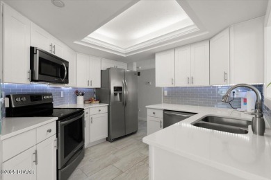 STUNNING GOLF COURSE COMMUNITY CONDO FEATURING SPECTACULAR on Oceans Golf Club in Florida - for sale on GolfHomes.com, golf home, golf lot