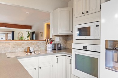 Welcome to 151 Ives Road, a bright and charming 3-bedroom home on Potowomut Golf Club in Rhode Island - for sale on GolfHomes.com, golf home, golf lot