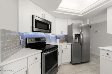 STUNNING GOLF COURSE COMMUNITY CONDO FEATURING SPECTACULAR on Oceans Golf Club in Florida - for sale on GolfHomes.com, golf home, golf lot