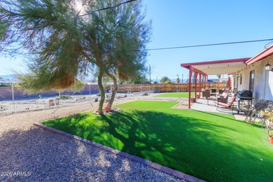 Nestled in a highly desirable central neighborhood, this on London Bridge Golf Course in Arizona - for sale on GolfHomes.com, golf home, golf lot