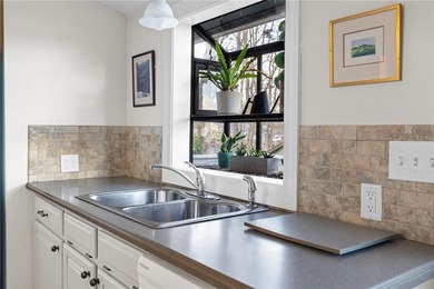 Welcome to 151 Ives Road, a bright and charming 3-bedroom home on Potowomut Golf Club in Rhode Island - for sale on GolfHomes.com, golf home, golf lot