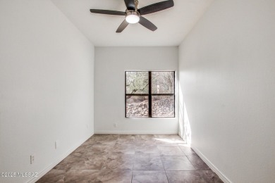 New Listing Alert!   Ground-level condo updated with a modern on The Lodge at Ventana Canyon - Canyon  in Arizona - for sale on GolfHomes.com, golf home, golf lot