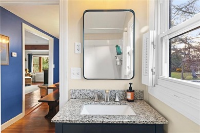 Welcome to 151 Ives Road, a bright and charming 3-bedroom home on Potowomut Golf Club in Rhode Island - for sale on GolfHomes.com, golf home, golf lot