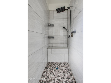 New Listing Alert!   Ground-level condo updated with a modern on The Lodge at Ventana Canyon - Canyon  in Arizona - for sale on GolfHomes.com, golf home, golf lot