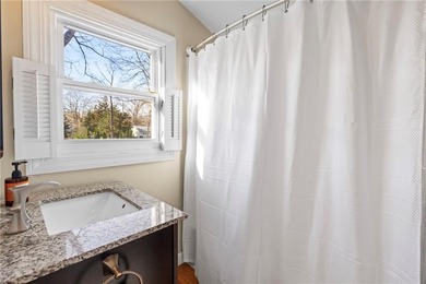 Welcome to 151 Ives Road, a bright and charming 3-bedroom home on Potowomut Golf Club in Rhode Island - for sale on GolfHomes.com, golf home, golf lot