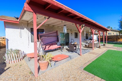 Nestled in a highly desirable central neighborhood, this on London Bridge Golf Course in Arizona - for sale on GolfHomes.com, golf home, golf lot
