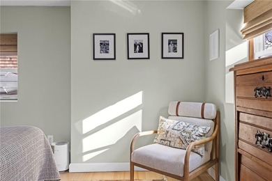 Welcome to 151 Ives Road, a bright and charming 3-bedroom home on Potowomut Golf Club in Rhode Island - for sale on GolfHomes.com, golf home, golf lot