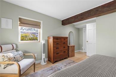 Welcome to 151 Ives Road, a bright and charming 3-bedroom home on Potowomut Golf Club in Rhode Island - for sale on GolfHomes.com, golf home, golf lot