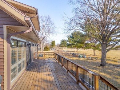 This custom-built home sits on the edge of Walter's Ridge golf on Pheasant Ridge Municipal Golf Course in Iowa - for sale on GolfHomes.com, golf home, golf lot