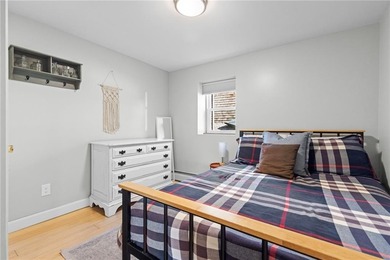 Welcome to 151 Ives Road, a bright and charming 3-bedroom home on Potowomut Golf Club in Rhode Island - for sale on GolfHomes.com, golf home, golf lot