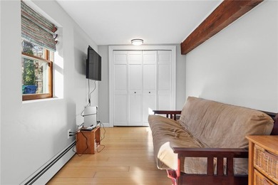 Welcome to 151 Ives Road, a bright and charming 3-bedroom home on Potowomut Golf Club in Rhode Island - for sale on GolfHomes.com, golf home, golf lot