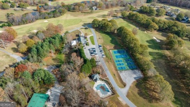 Discover the perfect canvas for your dream home with this on The Orchard Golf and Country Club in Georgia - for sale on GolfHomes.com, golf home, golf lot