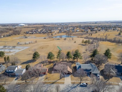 This custom-built home sits on the edge of Walter's Ridge golf on Pheasant Ridge Municipal Golf Course in Iowa - for sale on GolfHomes.com, golf home, golf lot