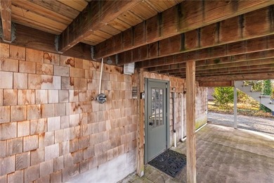 Welcome to 151 Ives Road, a bright and charming 3-bedroom home on Potowomut Golf Club in Rhode Island - for sale on GolfHomes.com, golf home, golf lot