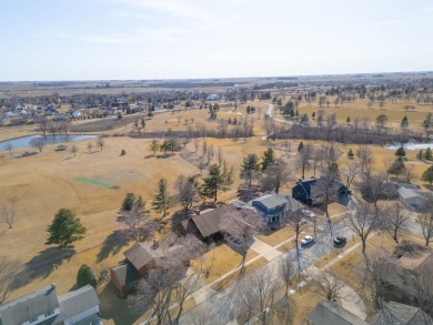 This custom-built home sits on the edge of Walter's Ridge golf on Pheasant Ridge Municipal Golf Course in Iowa - for sale on GolfHomes.com, golf home, golf lot