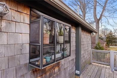 Welcome to 151 Ives Road, a bright and charming 3-bedroom home on Potowomut Golf Club in Rhode Island - for sale on GolfHomes.com, golf home, golf lot