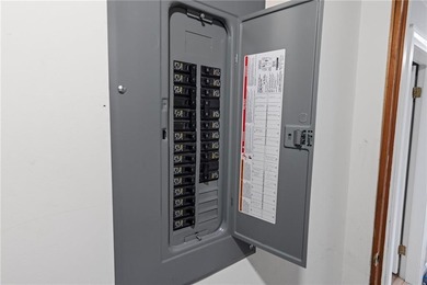 Welcome to 151 Ives Road, a bright and charming 3-bedroom home on Potowomut Golf Club in Rhode Island - for sale on GolfHomes.com, golf home, golf lot