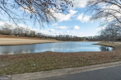 Discover the perfect canvas for your dream home with this on The Orchard Golf and Country Club in Georgia - for sale on GolfHomes.com, golf home, golf lot