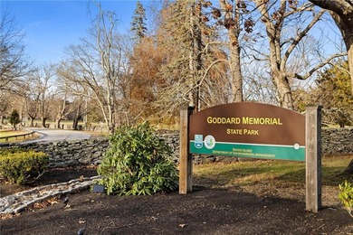 Welcome to 151 Ives Road, a bright and charming 3-bedroom home on Potowomut Golf Club in Rhode Island - for sale on GolfHomes.com, golf home, golf lot