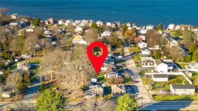 Welcome to 151 Ives Road, a bright and charming 3-bedroom home on Potowomut Golf Club in Rhode Island - for sale on GolfHomes.com, golf home, golf lot