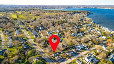 Welcome to 151 Ives Road, a bright and charming 3-bedroom home on Potowomut Golf Club in Rhode Island - for sale on GolfHomes.com, golf home, golf lot