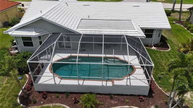 Be a part of Burnt Store Isles in this beautiful home located on on Twin Isles Country Club in Florida - for sale on GolfHomes.com, golf home, golf lot