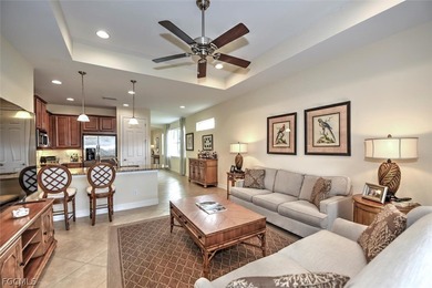 This open and bright home features high ceilings, abundant on Herons Glen Golf and Country Club in Florida - for sale on GolfHomes.com, golf home, golf lot