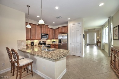 This open and bright home features high ceilings, abundant on Herons Glen Golf and Country Club in Florida - for sale on GolfHomes.com, golf home, golf lot