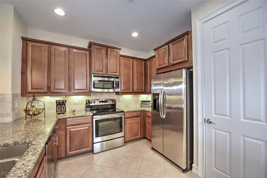 This open and bright home features high ceilings, abundant on Herons Glen Golf and Country Club in Florida - for sale on GolfHomes.com, golf home, golf lot