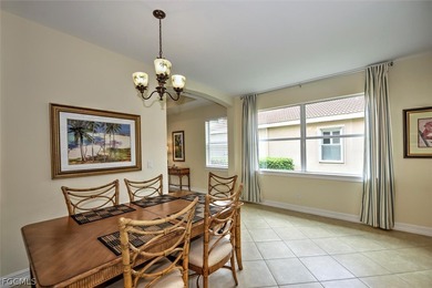 This open and bright home features high ceilings, abundant on Herons Glen Golf and Country Club in Florida - for sale on GolfHomes.com, golf home, golf lot