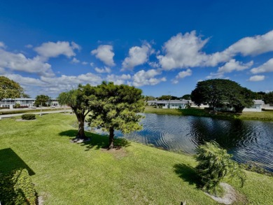 True waterfront unit with relaxing water views from your patio on Kings Point Golf - Executive in Florida - for sale on GolfHomes.com, golf home, golf lot