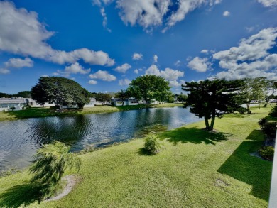 True waterfront unit with relaxing water views from your patio on Kings Point Golf - Executive in Florida - for sale on GolfHomes.com, golf home, golf lot