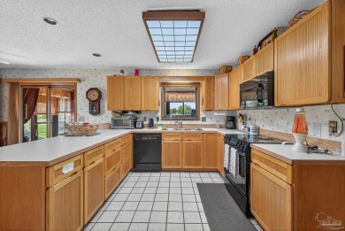 This lovely 1984 home is full of charm and great updates you'll on Perdido Bay Golf Club in Florida - for sale on GolfHomes.com, golf home, golf lot