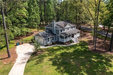 Welcome home to this stunning farmhouse-style home nestled on an on Canongate At Flat Creek Club in Georgia - for sale on GolfHomes.com, golf home, golf lot