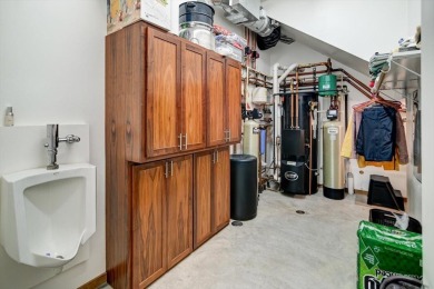 So many options with this home as it offers something for on Coachmans Golf Resort in Wisconsin - for sale on GolfHomes.com, golf home, golf lot