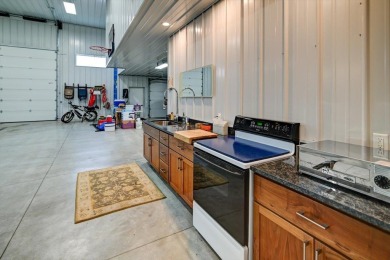 So many options with this home as it offers something for on Coachmans Golf Resort in Wisconsin - for sale on GolfHomes.com, golf home, golf lot