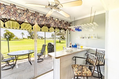 Indulge in the epitome of South Florida living! Imagine waking on Leisureville Community Golf Course in Florida - for sale on GolfHomes.com, golf home, golf lot