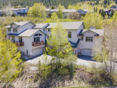 Indulge in breathtaking vistas from the expansive, airy living on Eagle Vail Golf Course in Colorado - for sale on GolfHomes.com, golf home, golf lot