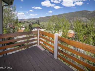 Indulge in breathtaking vistas from the expansive, airy living on Eagle Vail Golf Course in Colorado - for sale on GolfHomes.com, golf home, golf lot