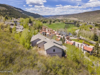 Indulge in breathtaking vistas from the expansive, airy living on Eagle Vail Golf Course in Colorado - for sale on GolfHomes.com, golf home, golf lot