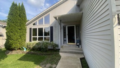 MAJOR POTENTIAL with this Custom built contemporary 1.5 story on Lakes of the Four Seasons Country Club in Indiana - for sale on GolfHomes.com, golf home, golf lot